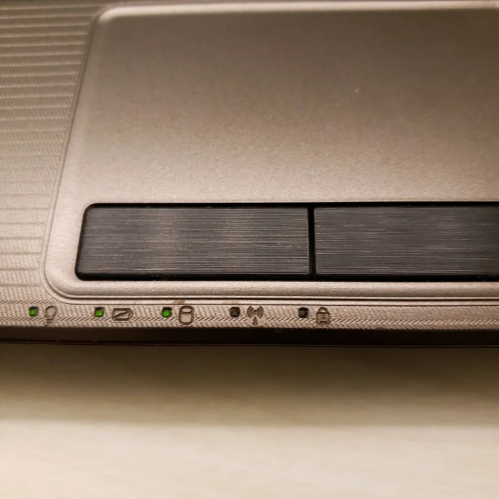 ASUS Silver Laptop with Black Keyboard WORKING